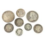 Two Queen Victoria half crowns dated 1895 and 1897, 1839 and 1865 one shilling coins, 1843 and 1871