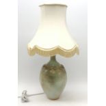 A studio pottery lamp, of baluster form with mottled green ground, lamp H40cm.