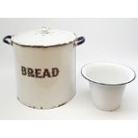 A large Vintage enamel twin handled bread bin and cover, H38cm.