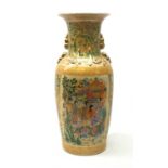 A large japanese vase, the yellow ground decorated with figural panels containing geishas within a m