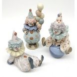 Three Lladro Clown figures: Littlest Clown, no.5811, Tired Friend, no.5812; and Having a Ball, no.58