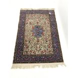Persian beige ground rug carpet, central medallion with floral field and border, 185cm x 125cm