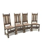 Set four Carolean style oak dining chairs, heavily carved and pierced cresting rail with floral deta