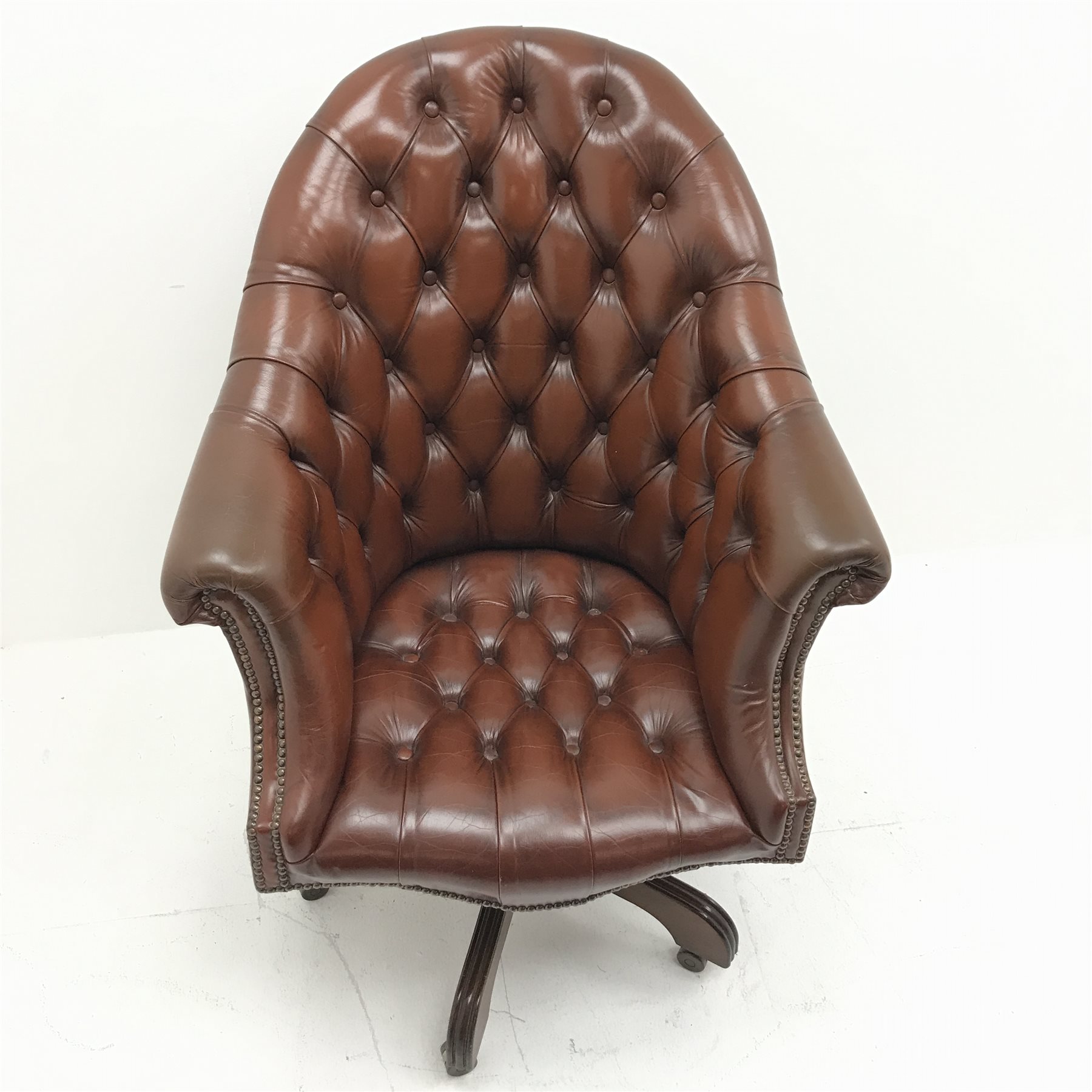 Library style swivel reclining desk chair, upholstered in deep buttoned and studded brown leather, f - Image 5 of 5