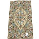 Crewel work beige ground wool chain rug, central medallion, 88cm x 50cm