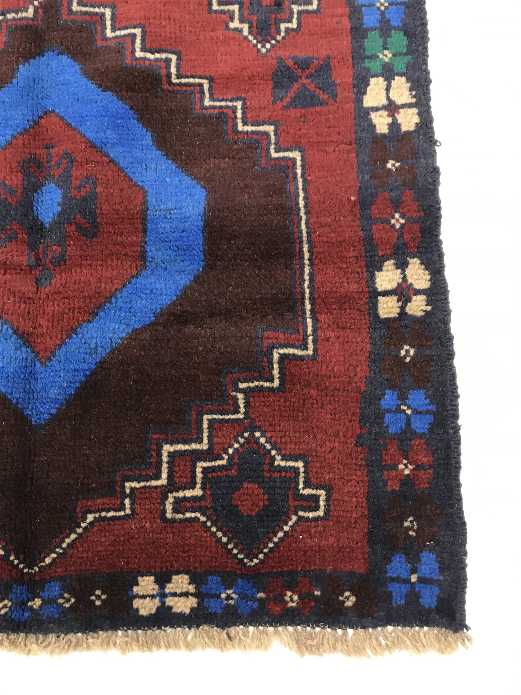 Baluchi red and blue ground rug, two medallions, 130cm x 83cm - Image 2 of 3