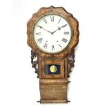 19th century drop dial wall clock, shaped front with circular Roman dial, leaf carved and pierced br