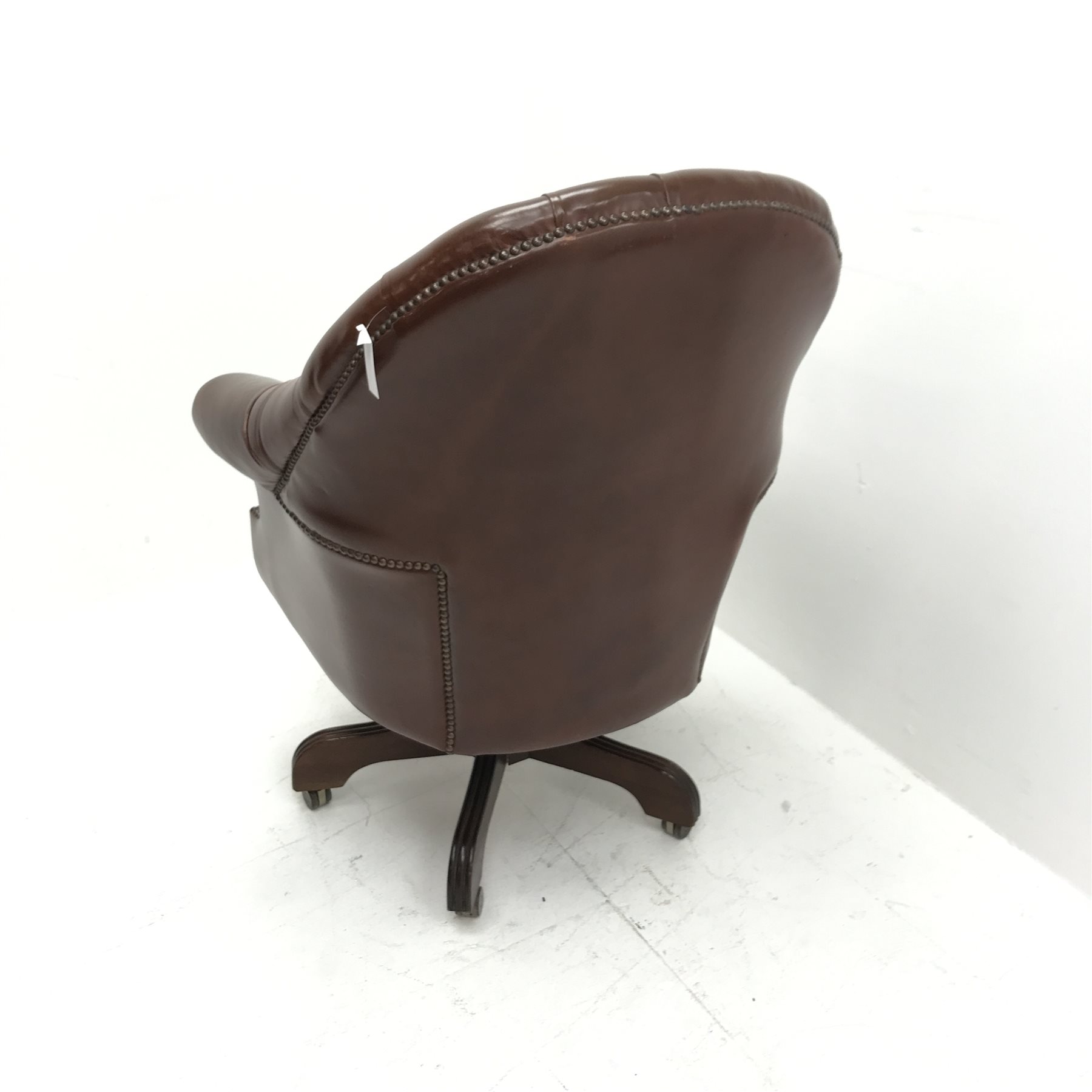 Library style swivel reclining desk chair, upholstered in deep buttoned and studded brown leather, f - Image 4 of 5