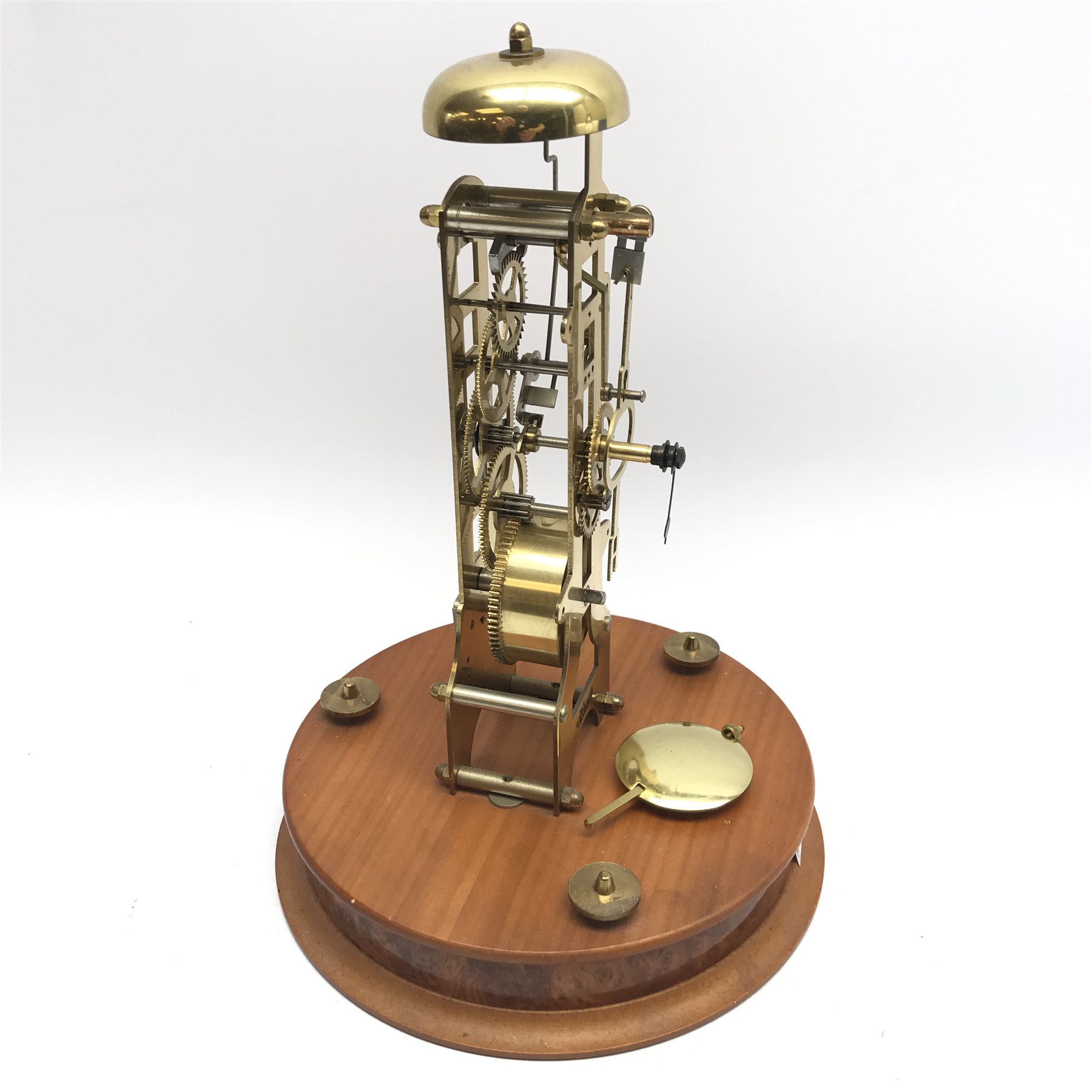 Hermle brass skeleton clock, single train driven movement, on circular fruitwood base with figured f - Image 4 of 4