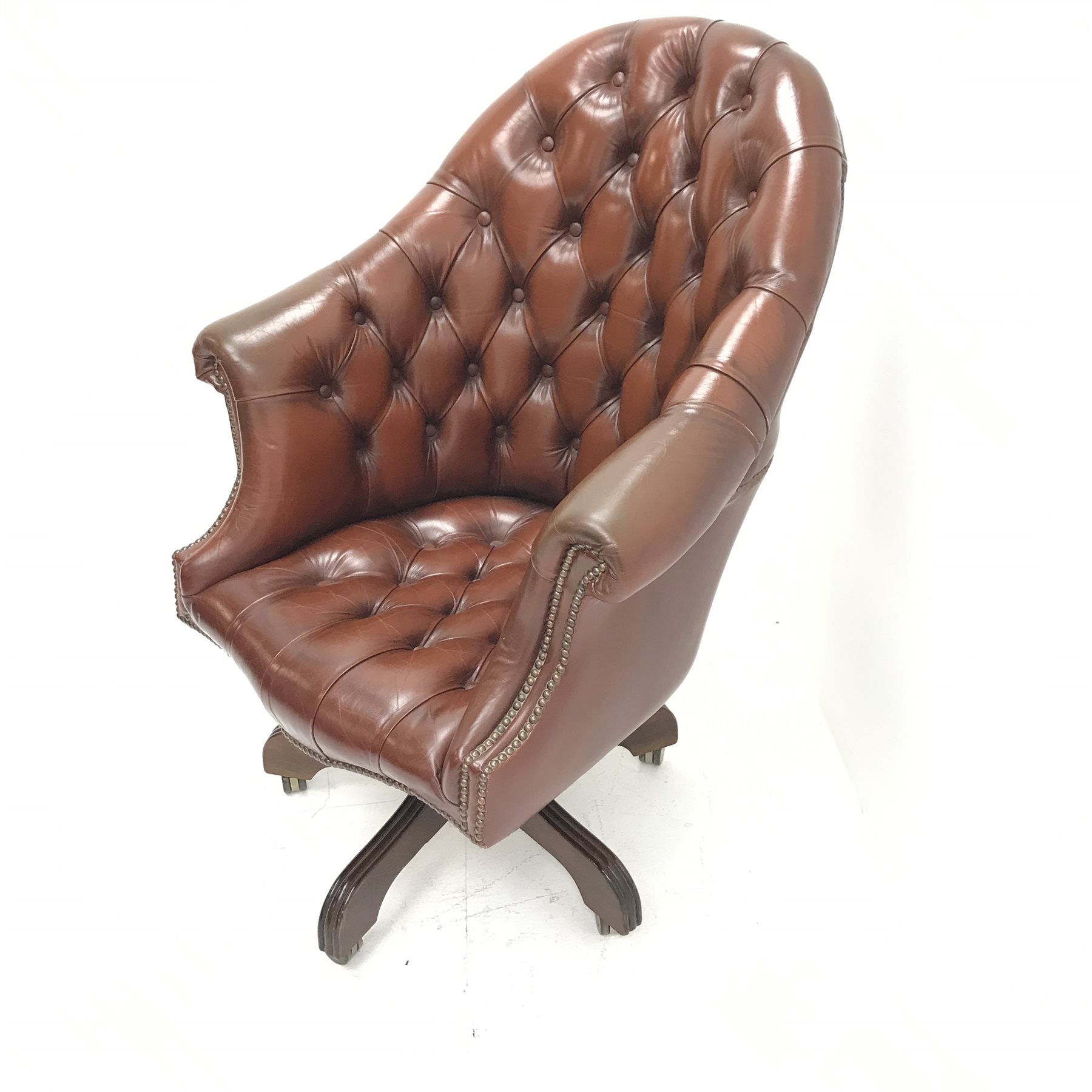 Library style swivel reclining desk chair, upholstered in deep buttoned and studded brown leather, f - Image 3 of 5