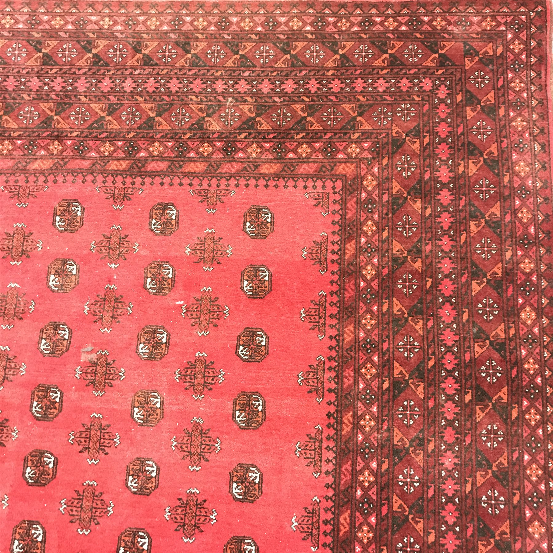 Bokhara red ground rug, repeating border, patterned field, 290cm x 202cm - Image 2 of 3