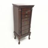 Narrow mahogany pedestal chest, six graduating drawers flanked by two reeded columns on cabriole fee