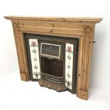 Cast iron inset fire with Art Nouveau style tiles, pine surround, W141cm, H117cm