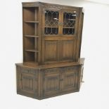 Old Charm - oak three sectional cocktail display cabinet, two lead glazed doors above fall front enc