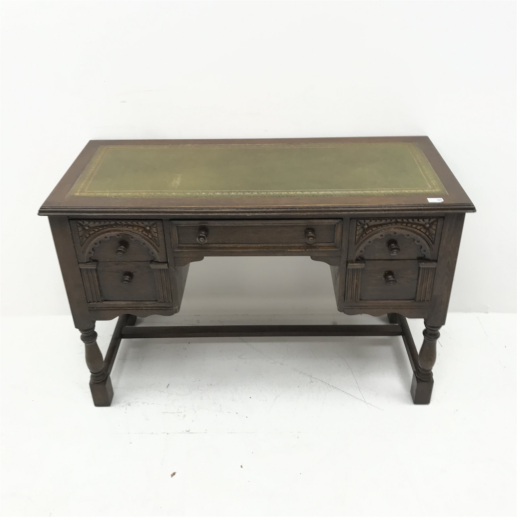 Mid 20th century oak writing desk, green leather inset top, five drawers, baluster supports joined b - Image 2 of 4