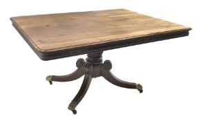 Regency mahogany breakfast table, rectangular moulded tilt top with rounded corners, turned and carv