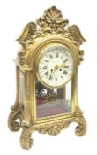 20th century French clock by Planchon Paris, decorative gilt case with shell pediment set on scrolle