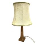 'Mouseman' oak table lamp, tapered octagonal form on carved square base, by Robert Thompson of Kilbu