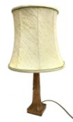 'Mouseman' oak table lamp, tapered octagonal form on carved square base, by Robert Thompson of Kilbu