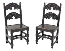 Pair late 19th century oak Yorkshire type chairs, backs relief carved with scrolls and foliage, half