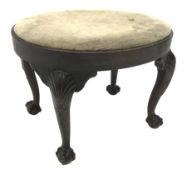 Georgian style walnut stool of oval form with plain frieze and upholstered drop-in seat on four cabr