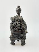 Chinese bronze 'Elephant' censer and cover, of tripod form cast with elephant handles and feet, the