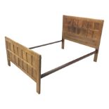 'Mouseman' 4' 6'' panelled oak bedstead with arcade carved cresting rails, by Robert Thompson of Kil