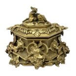 Late 19th century gilt bronze casket, of lozenge form with cast and applied detail in the form of ho