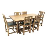 'Lizardman' oak refectory dining table with rectangular adzed top, twin pillar supports on sledge fe