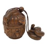 Japanese Meiji carved wooden inro, modelled as a basket with snake and rats climbing over, with snak