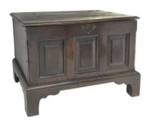 18th century oak coffer bach, the moulded hinged top above triple paneled front, on bracket feet, W6