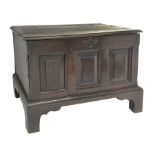 18th century oak coffer bach, the moulded hinged top above triple paneled front, on bracket feet, W6