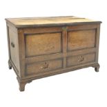 Early 19th century oak and mahogany banded mule chest, paneled front and sides, two false drawers to