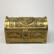 Secessionist brass casket, decorated in relief with ravens to the hinged opening cover and parrots t
