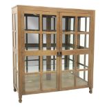 'Foxman' large oak and glazed display cabinet, two doors enclosing three glass shelves and mirrored