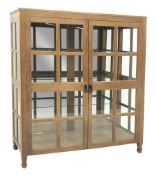 'Foxman' large oak and glazed display cabinet, two doors enclosing three glass shelves and mirrored