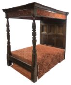 17th century and later Jacobean style oak four poster bed with canopy, the projecting canted cornice