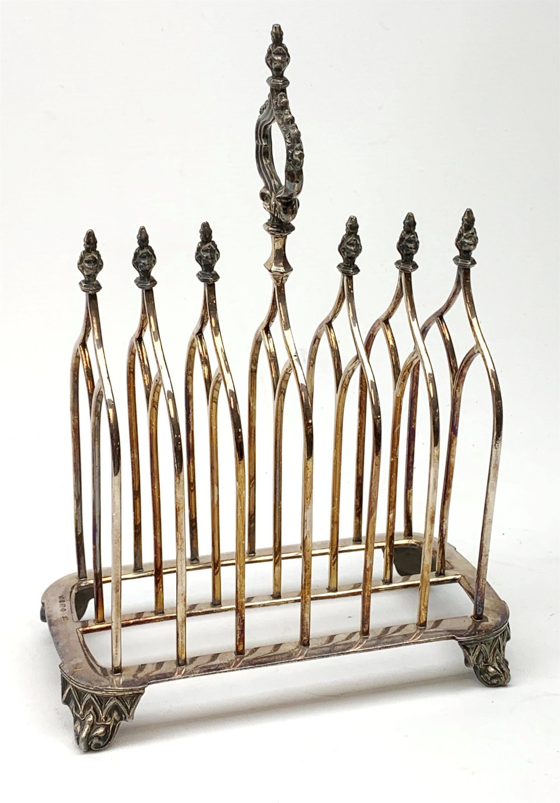 Victorian electroplate Gothic style toast rack, with seven arched bars, openwork handle and arcaded - Image 2 of 7