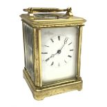 Early 20th century brass five glass carriage clock with button repeater, the brass case engraved wit