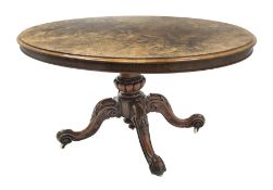 Victorian walnut loo table, highly figured oval tilt top with moulded edge, turned and gadroon carve