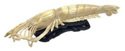 19th century Japanese carved ivory model of a crayfish, with accompanying wooden stand, L20cm