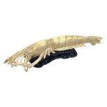 19th century Japanese carved ivory model of a crayfish, with accompanying wooden stand, L20cm