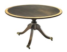 20th century mahogany and rosewood crossbanded circular tilt top dining table on turned column with