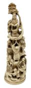 19th century Japanese carved ivory okimono, modelled as a tower of figures, H18cm