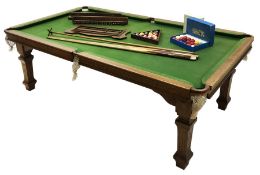 Edwardian 'E.J.Riley LTD' oak framed slate bed billiard table, with dining table leaves, green baize