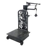 19th century platform scales by Parnall & Sons. Bristol, black painted cast iron, raised back decora