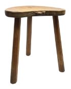 'Mouseman' oak three legged stool with kidney shaped dished seat, by Robert Thompson of Kilburn, 37c