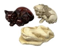 Japanese Meiji ivory Netsuke, modelled as a frog upon a lily pad, together with a further example mo