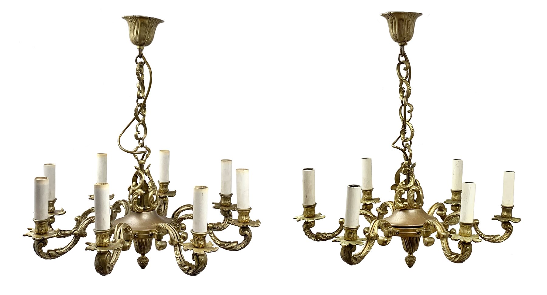 Two gilt bronze chandeliers, in the 18th century taste, the first with eight scrolling branches lead