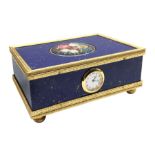 Reuge Music - simulated lapis lazuli automaton box, oval floral plate reveals singing bird, circular